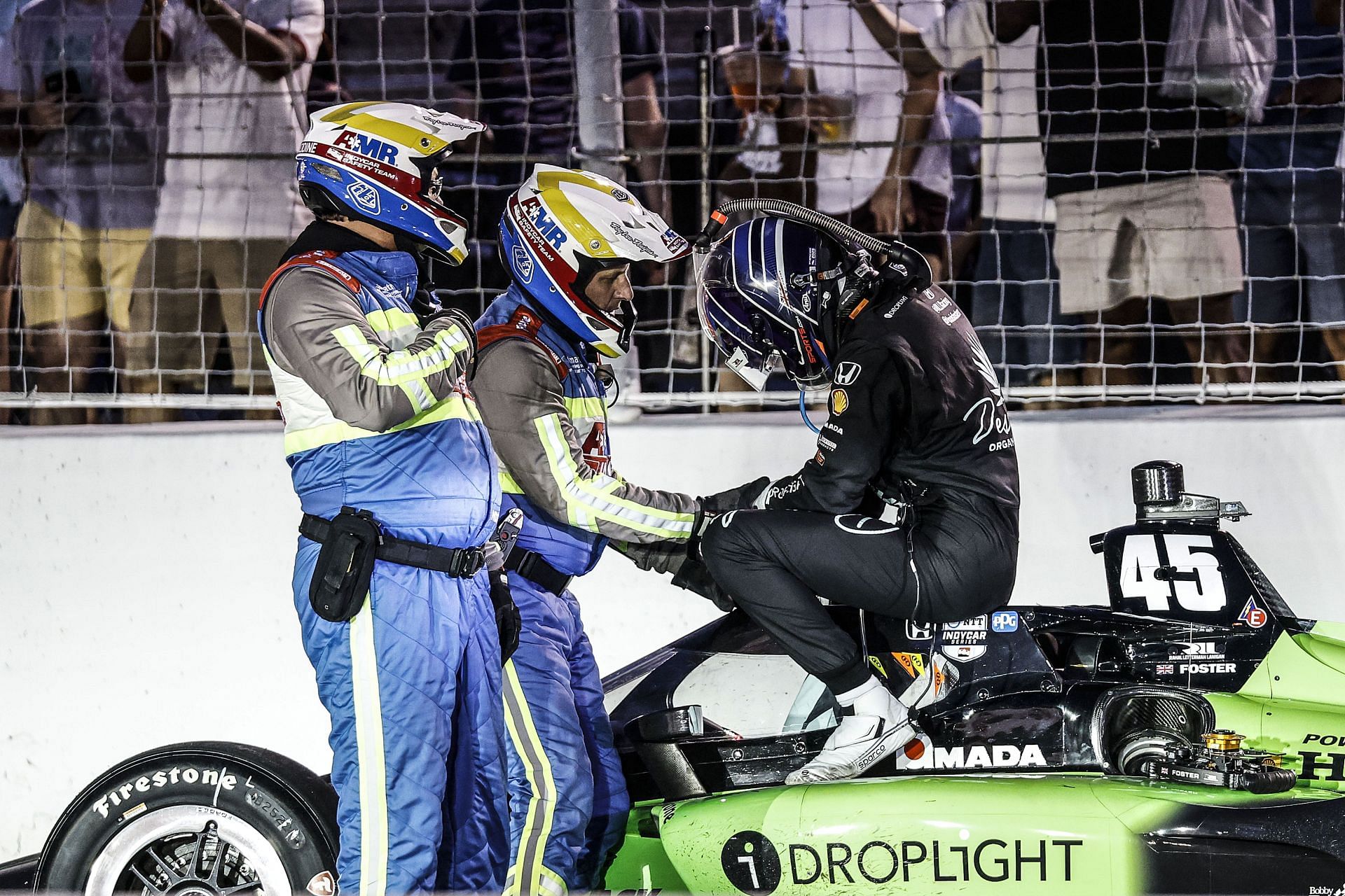 Marshals attend to Louis Foster after crash at the Bommarito Automotive Group 500 - Source: Getty
